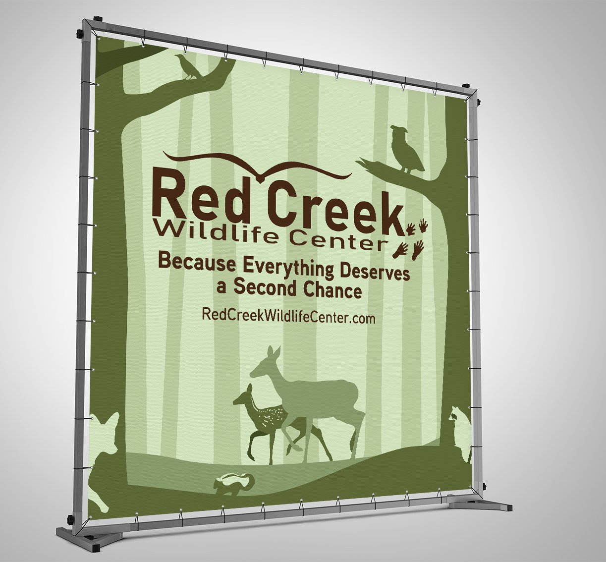 Red Creek Wildlife Center photography brackdrop with shilohetes of Pennsylvania native animals.